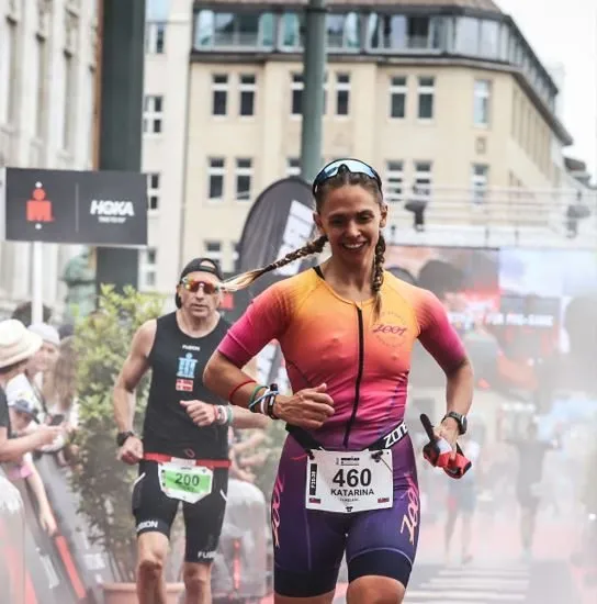 Kat Sherling approaching the finish at Ironman Hamburg